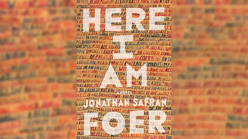 An extended book cover with the title Here I Am and the name of the author, Jonathan Safran Foer